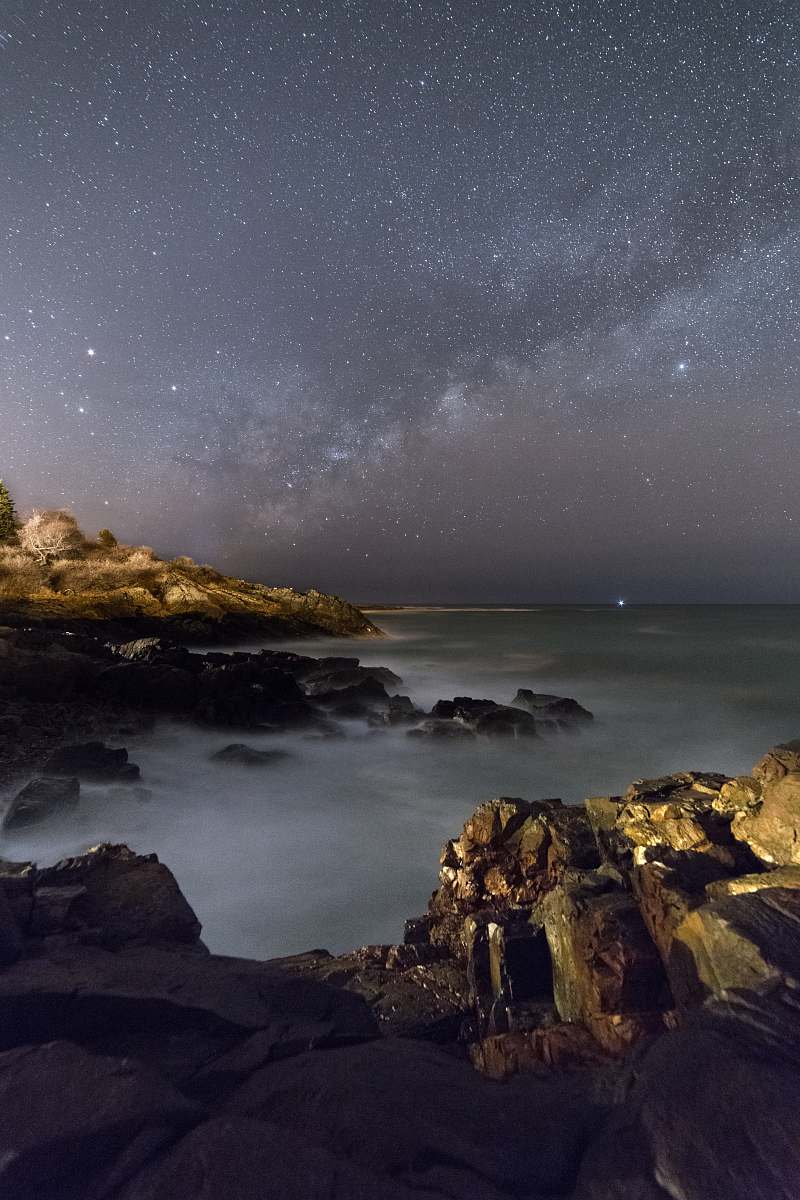 milky way mountains under starry sky night